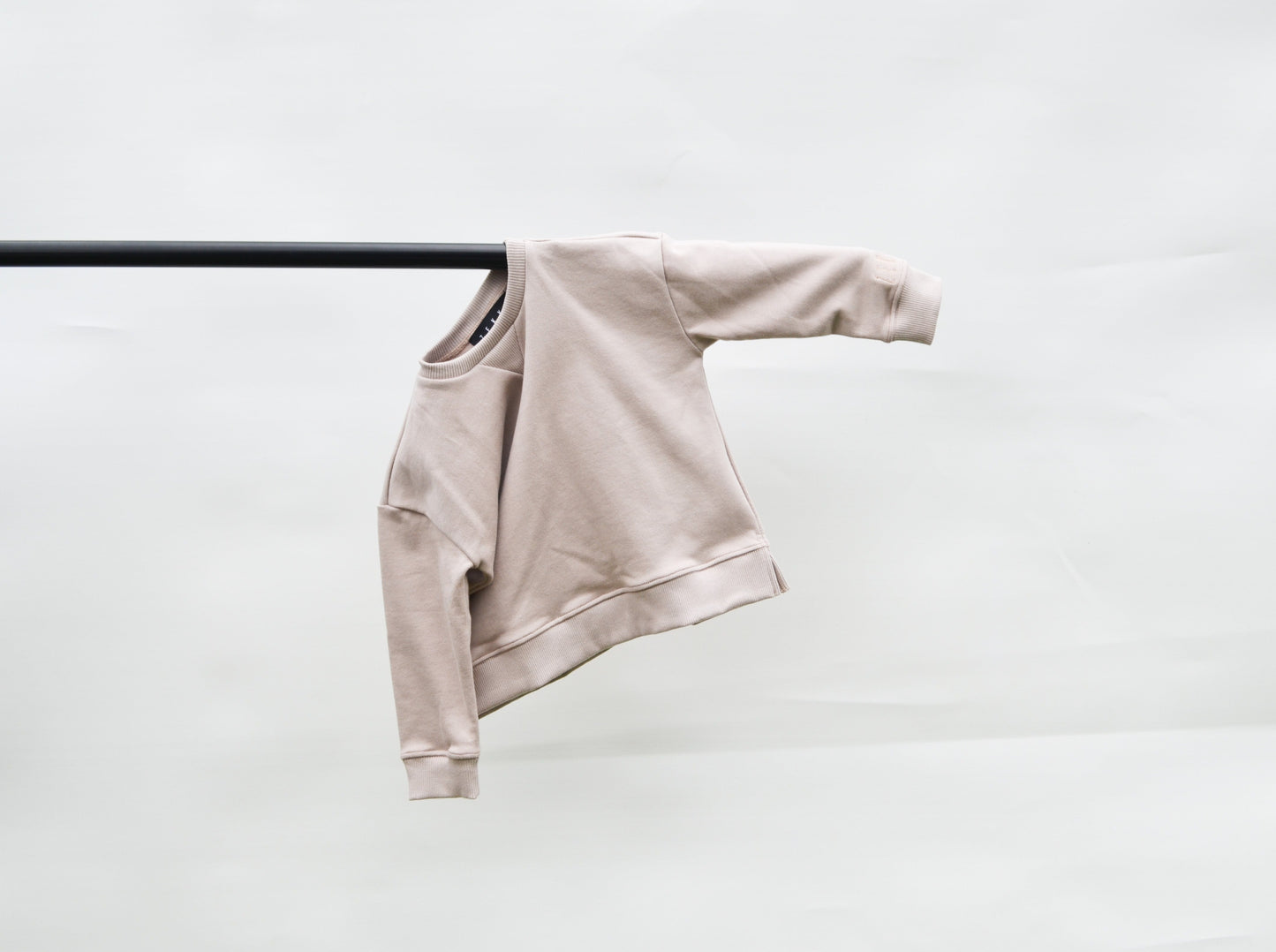 Smokey longline jumper hanging on a pole