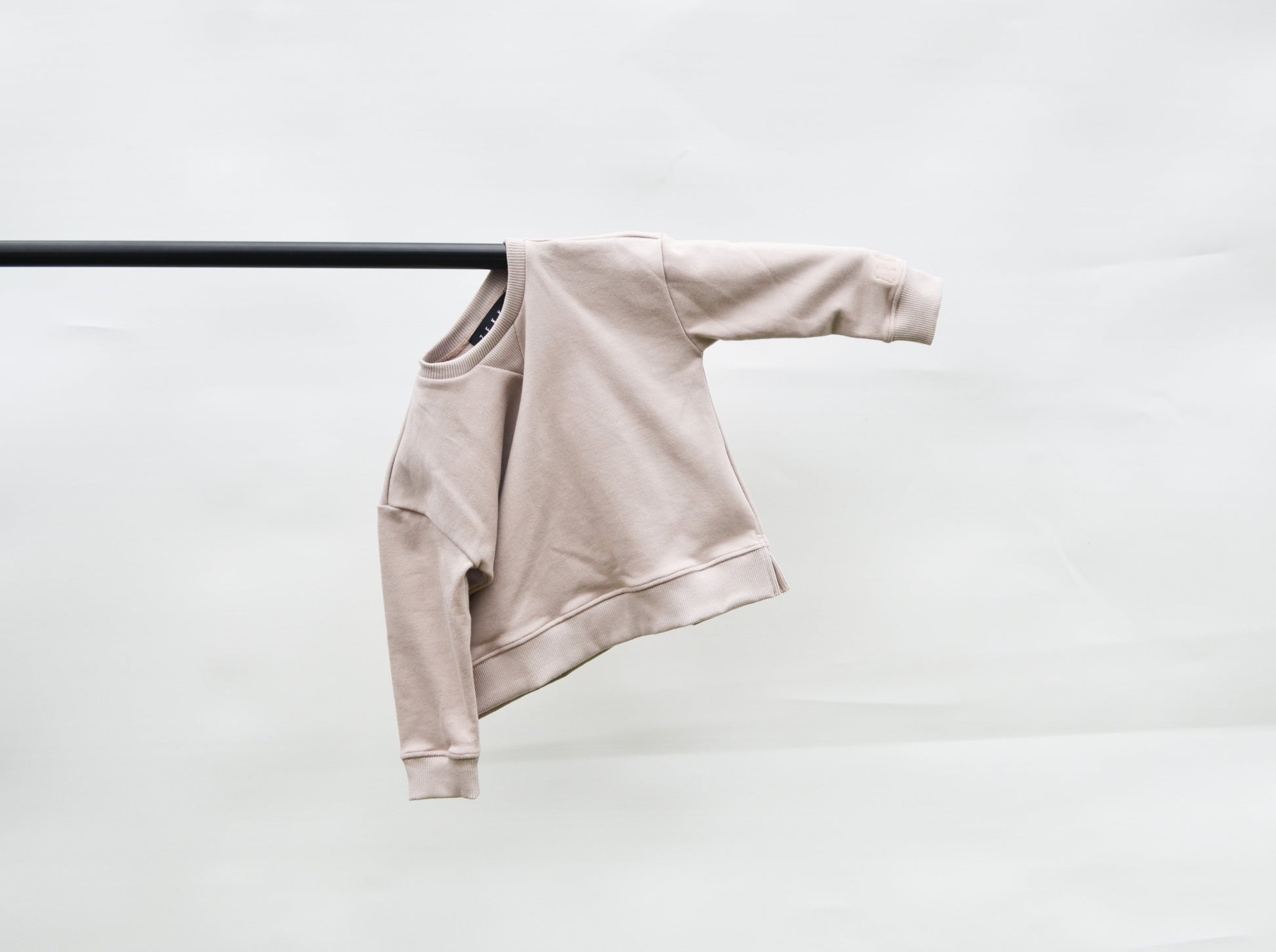 Smokey longline jumper hanging on a pole
